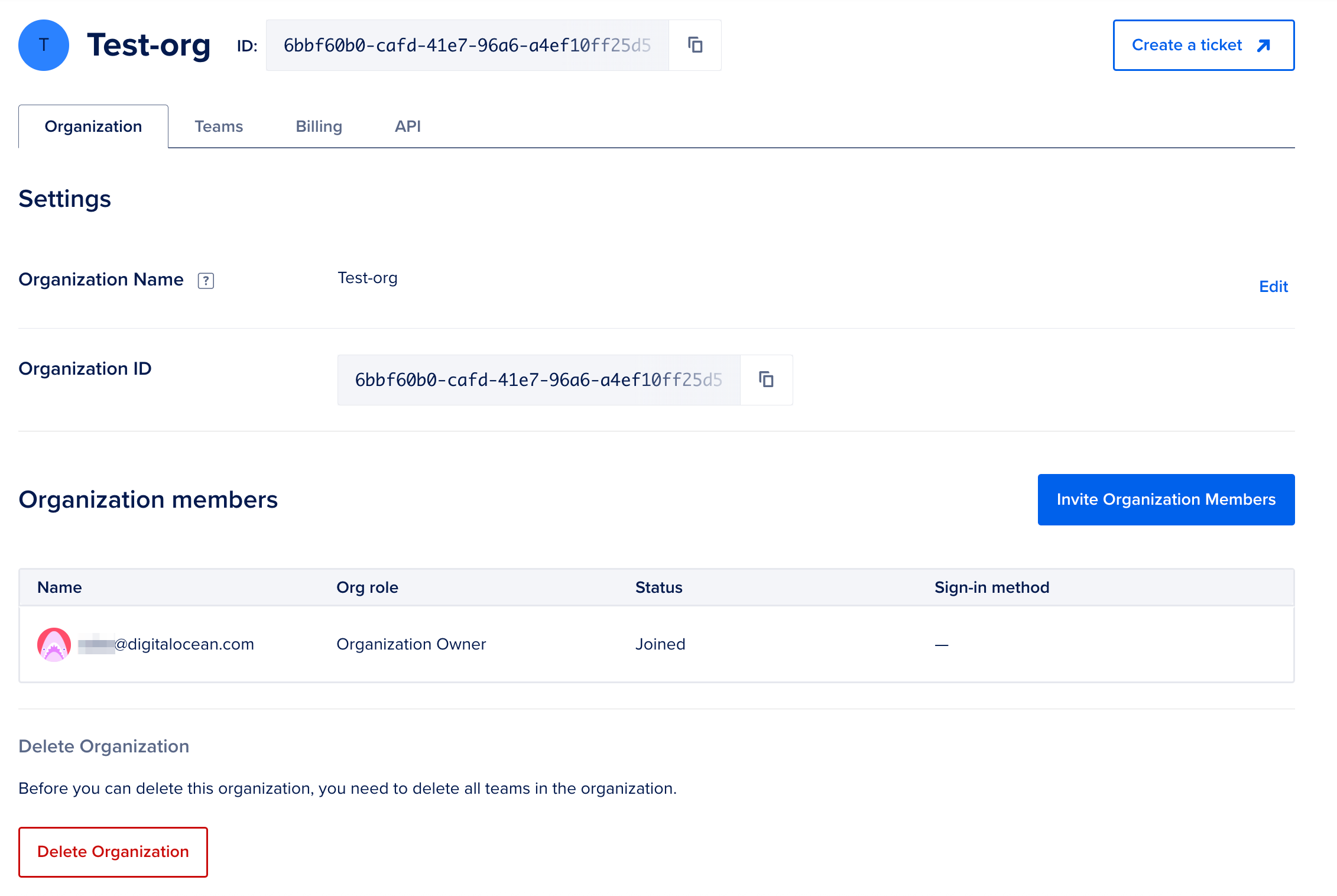 Organization settings page showing the organization name and ID, and a list of organization members with roles and status.